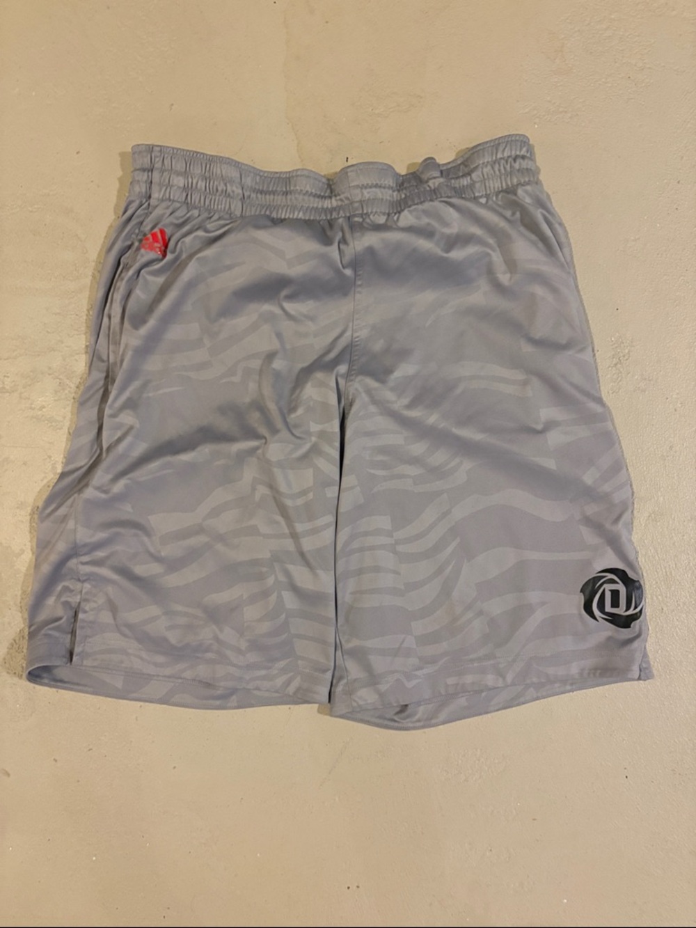 adidas Men's Light Gray Athletic Shorts with Subtle Wave Pattern